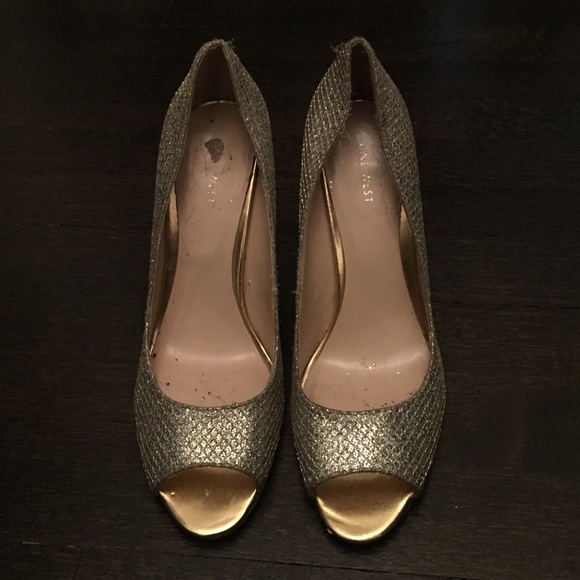 Size ten silver sparkly three inch heels
