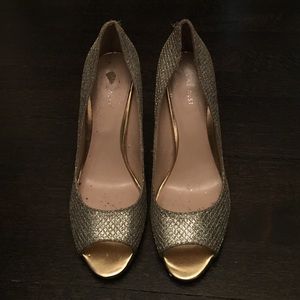 Size ten silver sparkly three inch heels