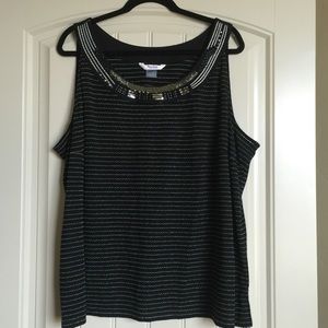Sleeveless Top with Embellishments.