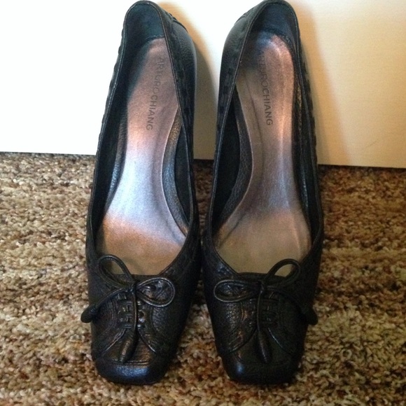 Arturo Chiang low heeled, black leather shoes.
