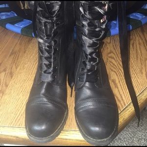Black women's floral army boots laced up