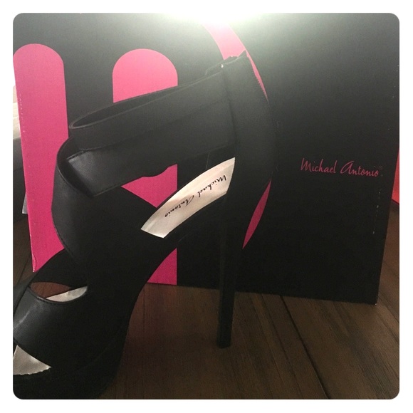 Brand new, never worn, black Michael Antonio heels