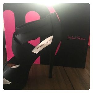 Brand new, never worn, black Michael Antonio heels