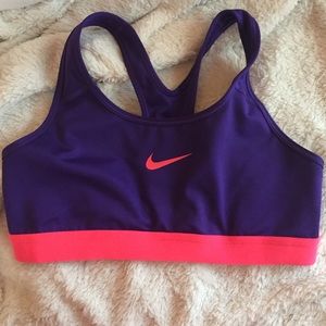Pink and purple Nike sports bra