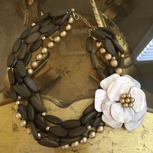 Multiple strand wood with flower pin necklace
