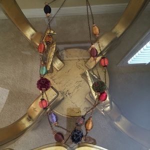 Anthropologie thread and Pom Pom necklace