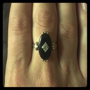 Gold color and onyx ring with fake diamond accent