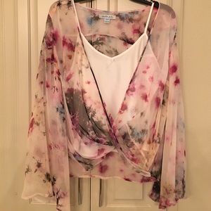 Twist front silk flutter sleeve blouse