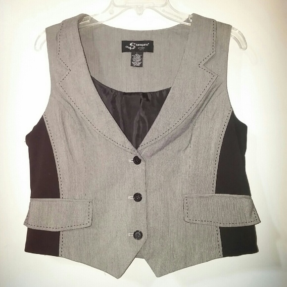 Gray and black vest.