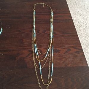 Multi layer gold/turquoise long necklace Multi layer gold/turquoise long necklace