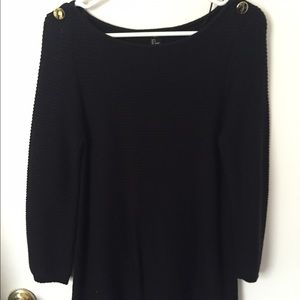 Black sweater with shoulder button detail