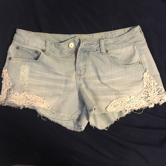 Denim shorts with lace accents