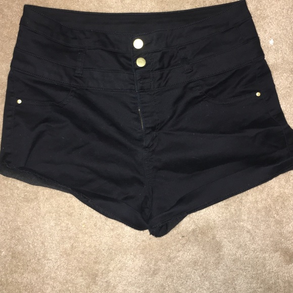 Black high waisted shorts with gold buttons!