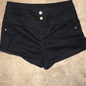 Black high waisted shorts with gold buttons!