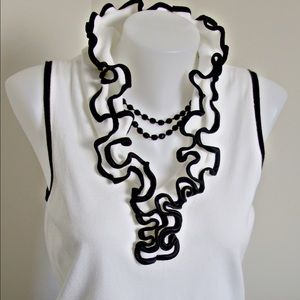 Sleeveless Ruffle Collar Sweater