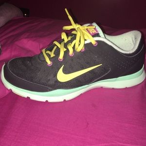 Nike training tennis shoes .