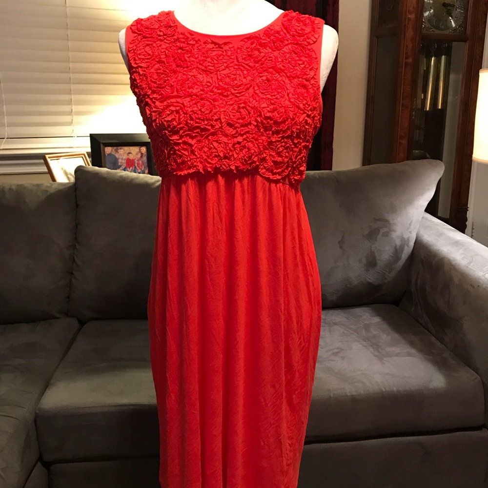 Orange dress with flowers.