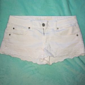 White shorts from AE with a flower hem