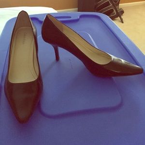 Pointy toed black pumps