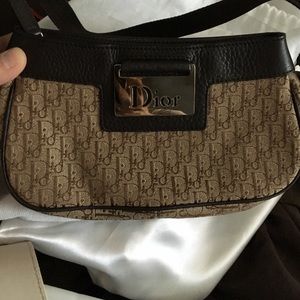 Small brown Dior clutch