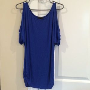 Bebe shirt with shoulder cut outs