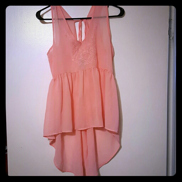 Backless pink sleeveless blouse