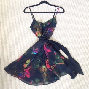Floral dress with sash and sheer overlay