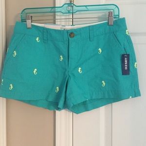 Old Navy teal shorts with lime green sea horses