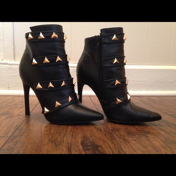 Black booties with gold stones