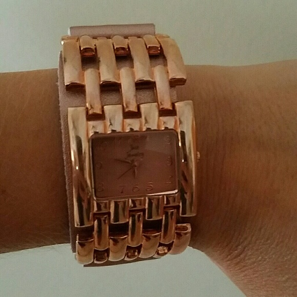 Copper color watch.