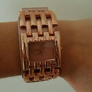 Copper color watch.