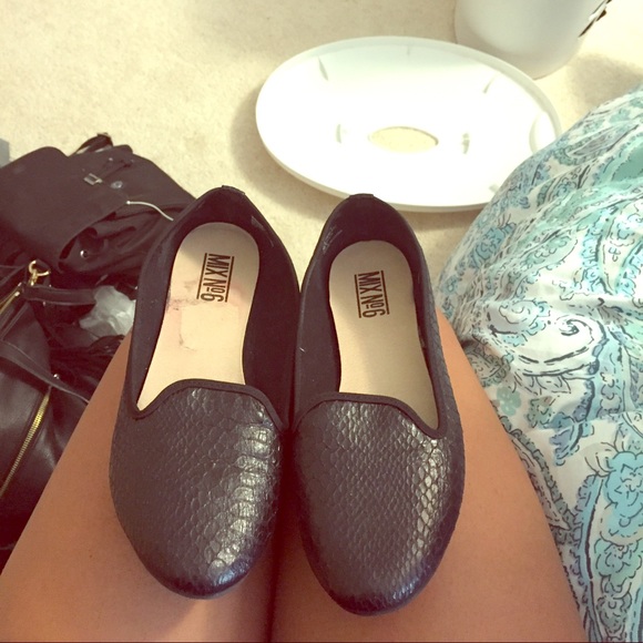 Black snakeskin look flats