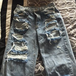 Distressed carmar denim jeans