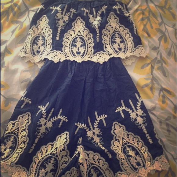 Strapless navy blue romper w lace details