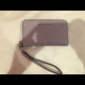 Purple Michael Kors wristlet