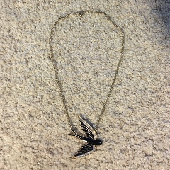 Gold and black bird necklace