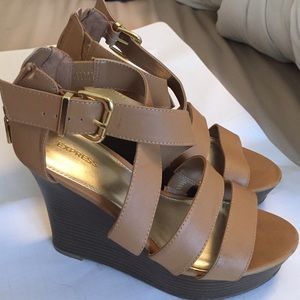 Express tan strappy wedges.