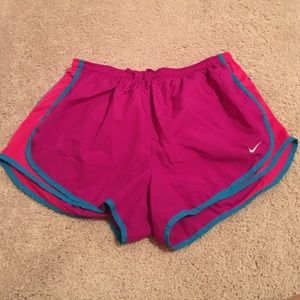 Fuchsia, hot pink and blue Nike DRI FIT shorts