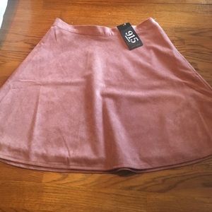 Light brown, circle skirt. Never worn.