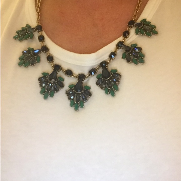 JCrew gold necklace with blue and green stones