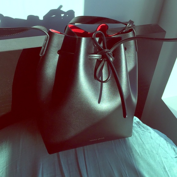 Mansur red interior black bucket bag