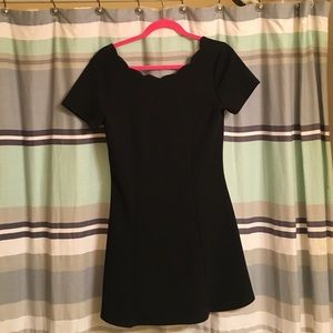 Scalloped little black dress with low back!