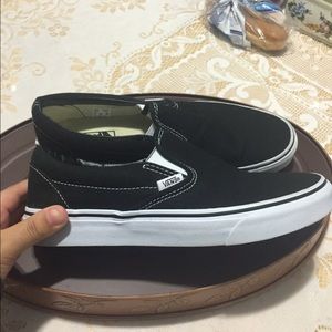 Black slip on Vans