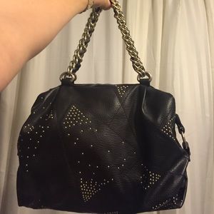 Black and gold Charming Charlie handbag