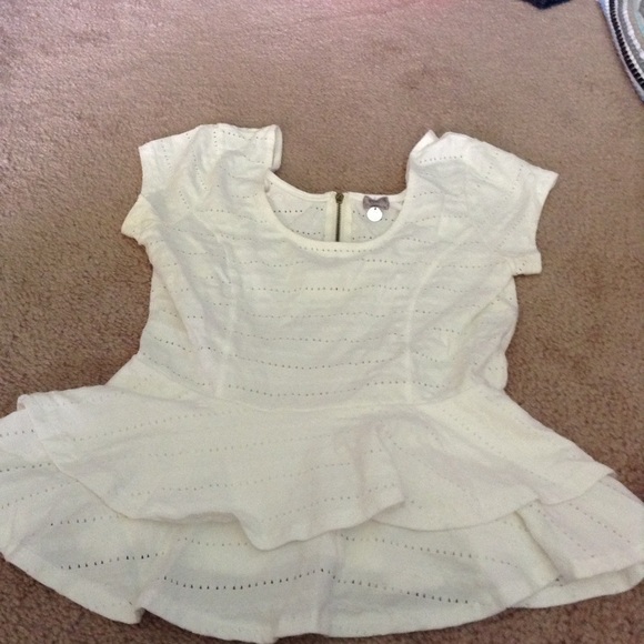 Cream short sleeve peplum top with zipper detail