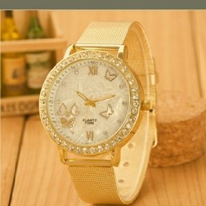 Ladies fancy butterfly encased watch