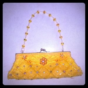 Yellow beaded little purse
