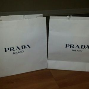 Two Prada bags.