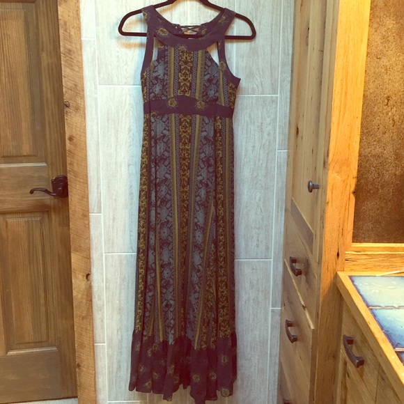 Maxi dress with empire waist and open back detail