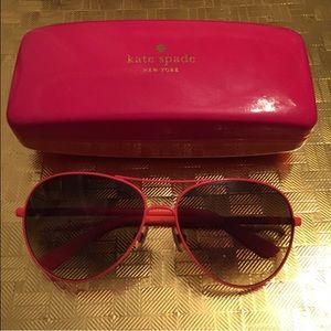 Kate Spade orange frame aviators.